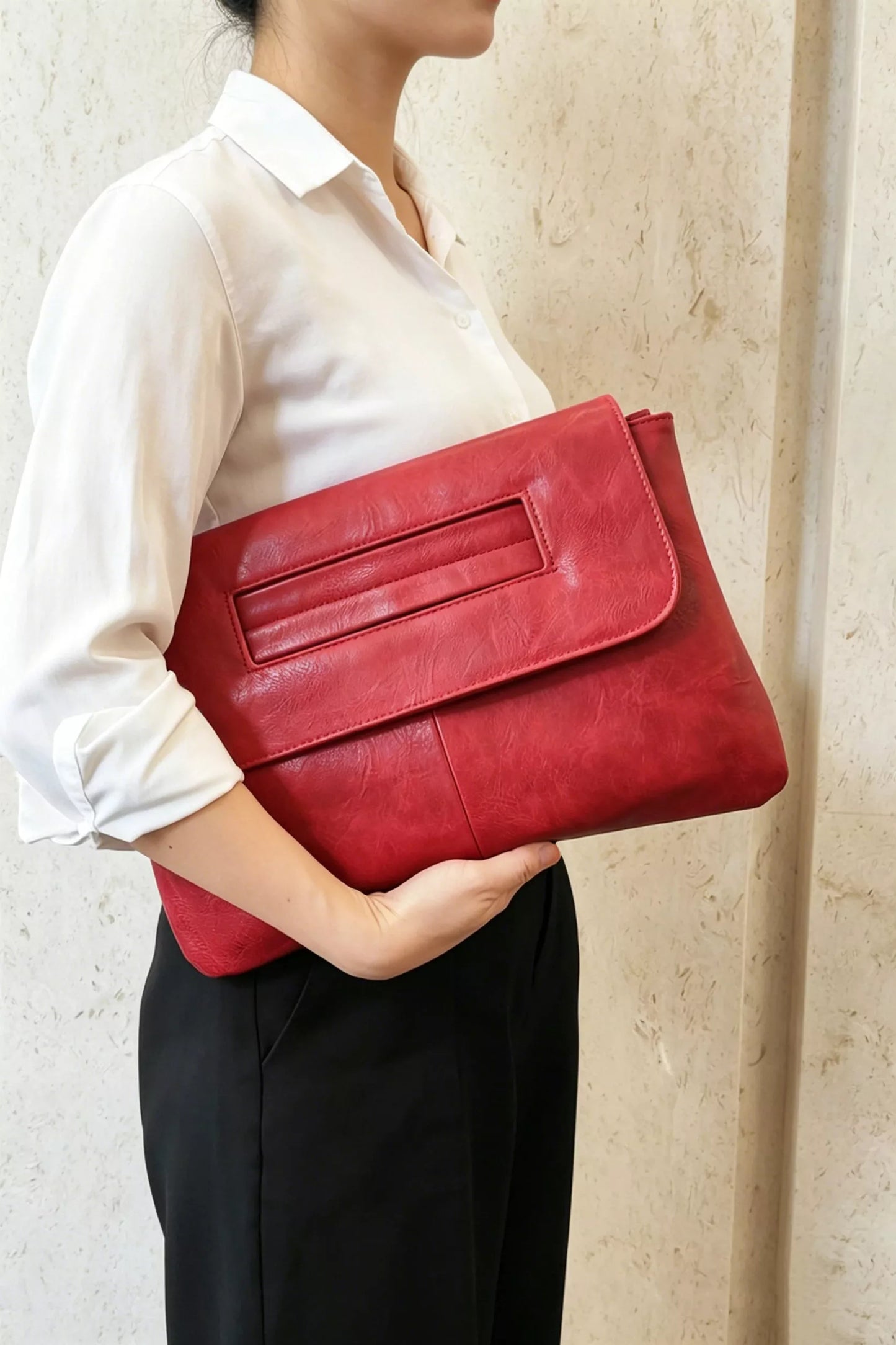 Vintage style envelope clutch handbag by Trendsi, featuring a sleek design and classic envelope shape in neutral tones.