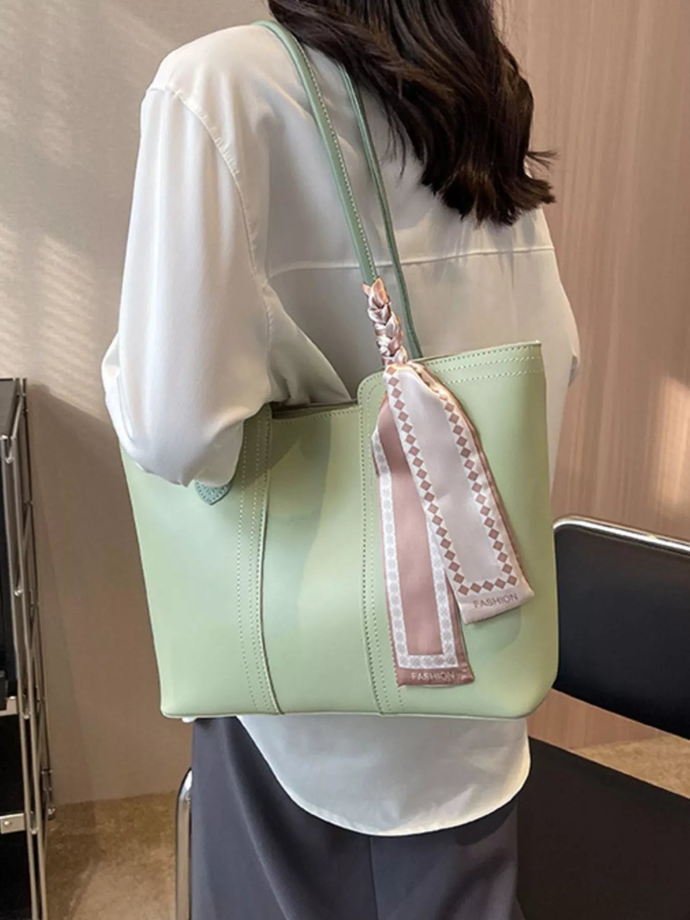 Casual Trendsi tote shoulder handbag with spacious interior and sturdy straps, perfect for everyday use and stylish carrying.