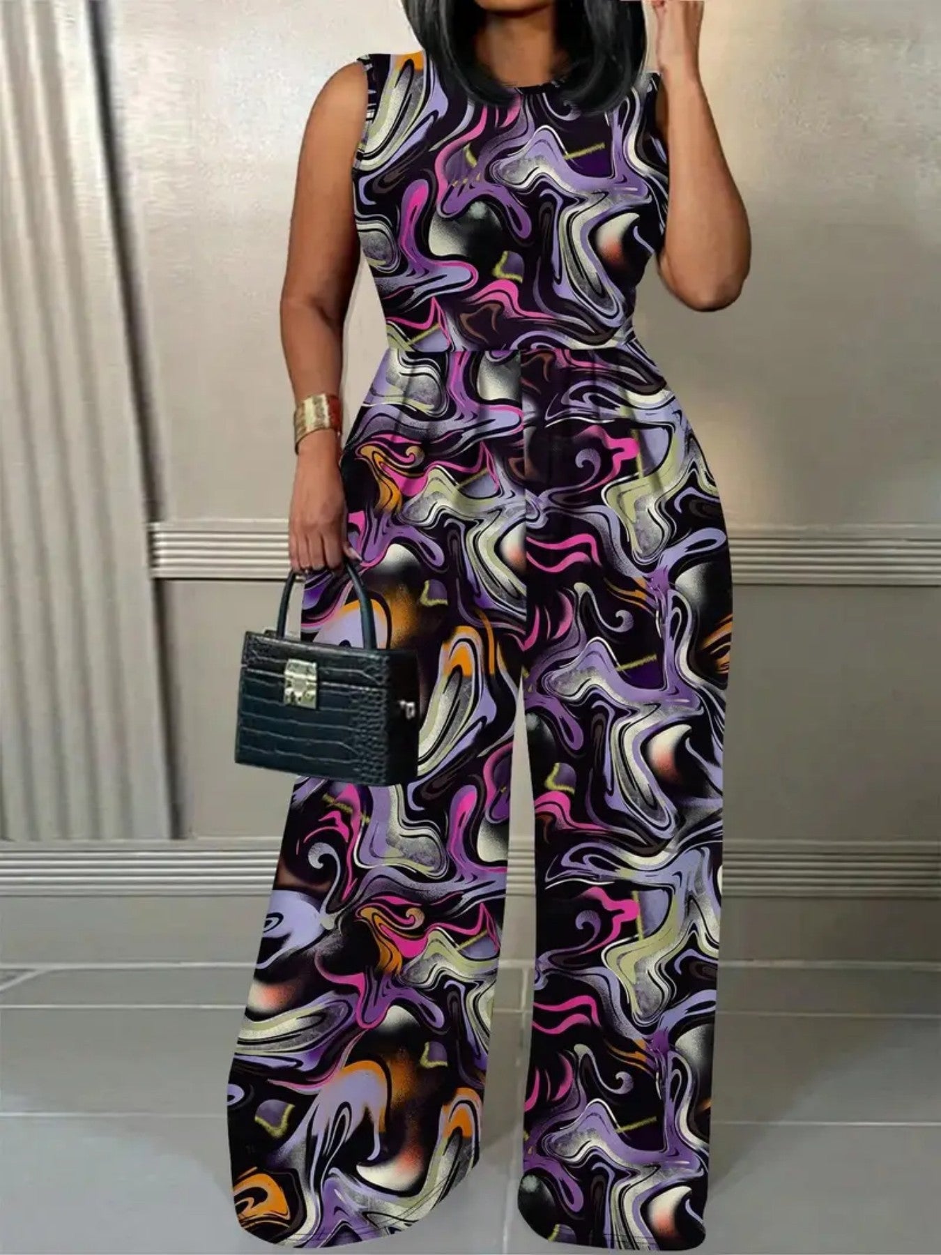 Sleeveless Round Neck Flared Hem Jumpsuit – Elegant, Flowy & All-in-One Statement Look