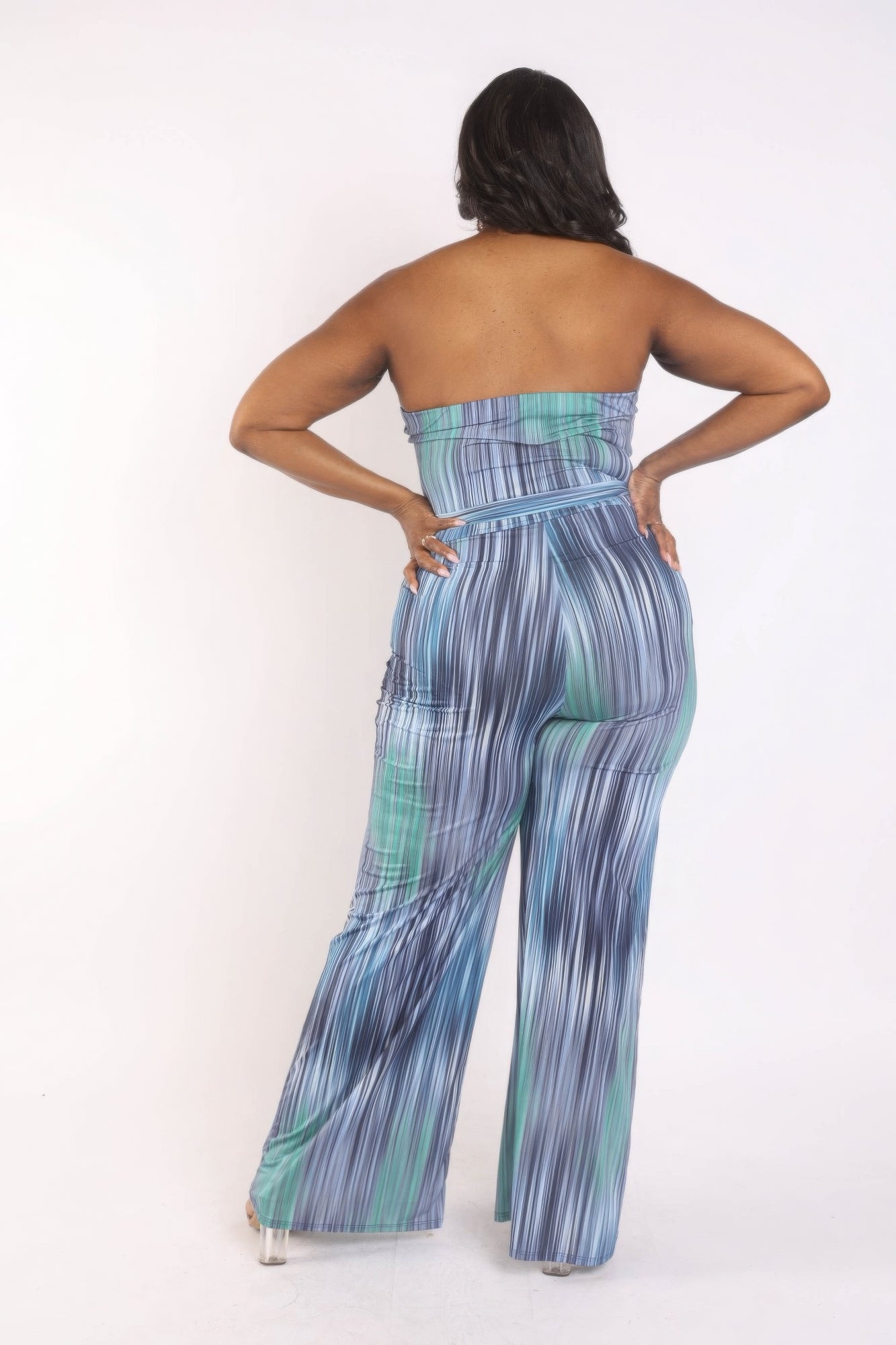 Wave print tube belted jumpsuit by Toshe Women's Fashions, featuring a stylish wave pattern, sleeveless design, and belted waist.