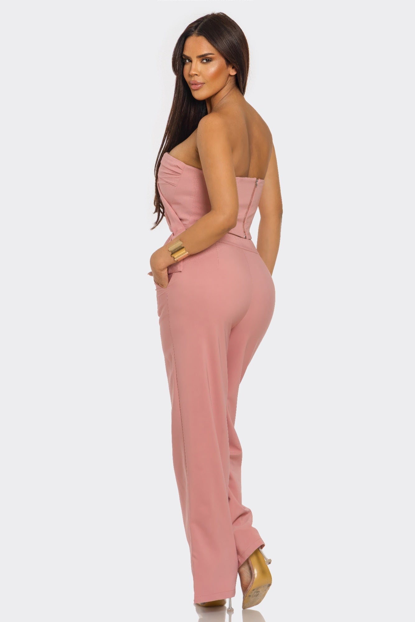 Sculpted Grace two-piece set by Toshe Women's Fashions featuring form-fitting design and stylish fabric in a neutral color.