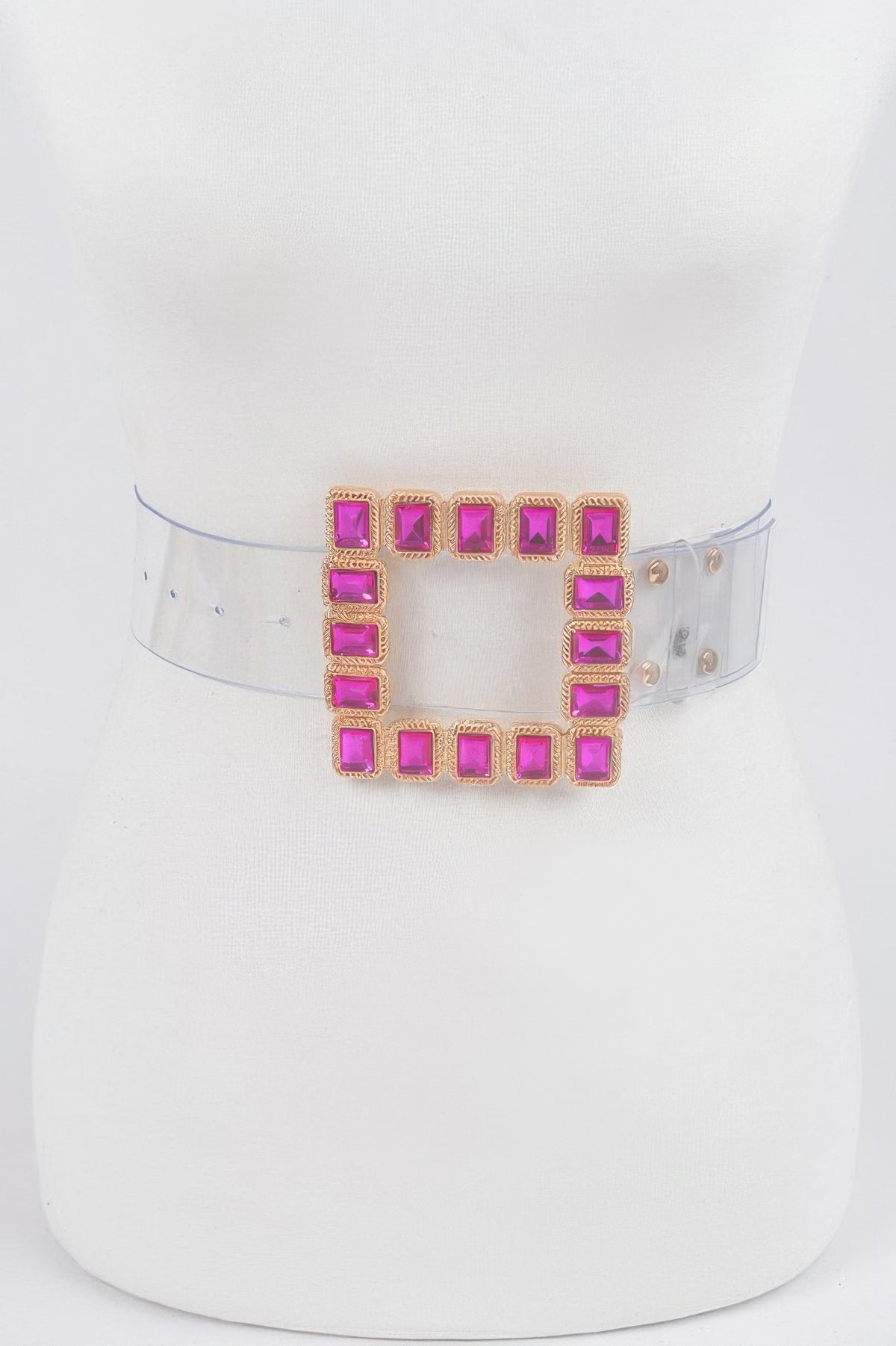 Transparent belt with stone buckle from Toshe Women's Fashions, showcasing clear design and decorative stone accents.