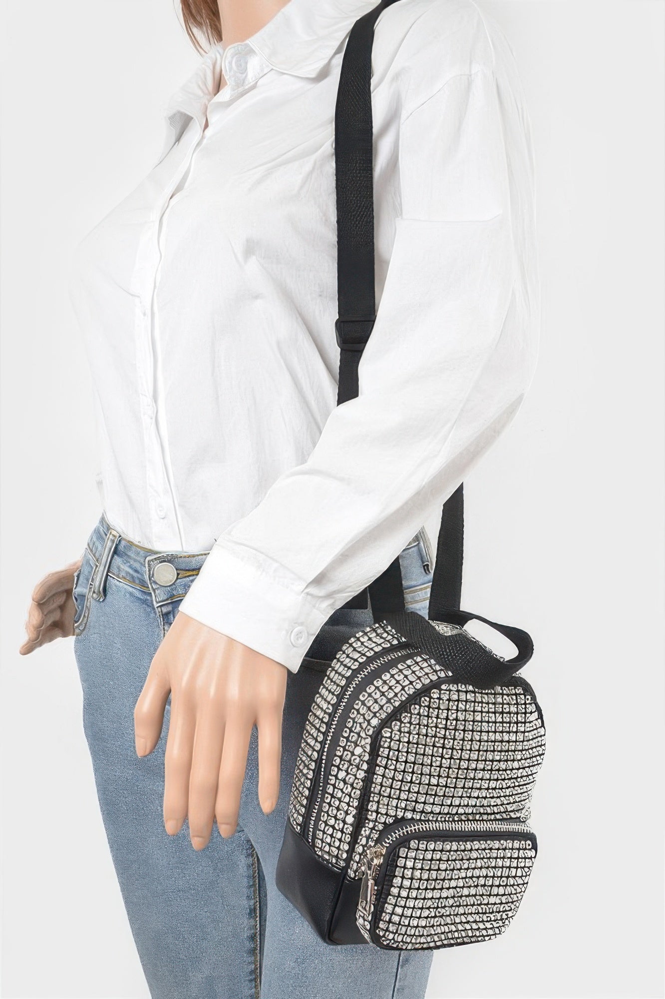 Shimmering rhinestone crossbody bag from Toshe Women's Fashions with a sleek design and adjustable strap.