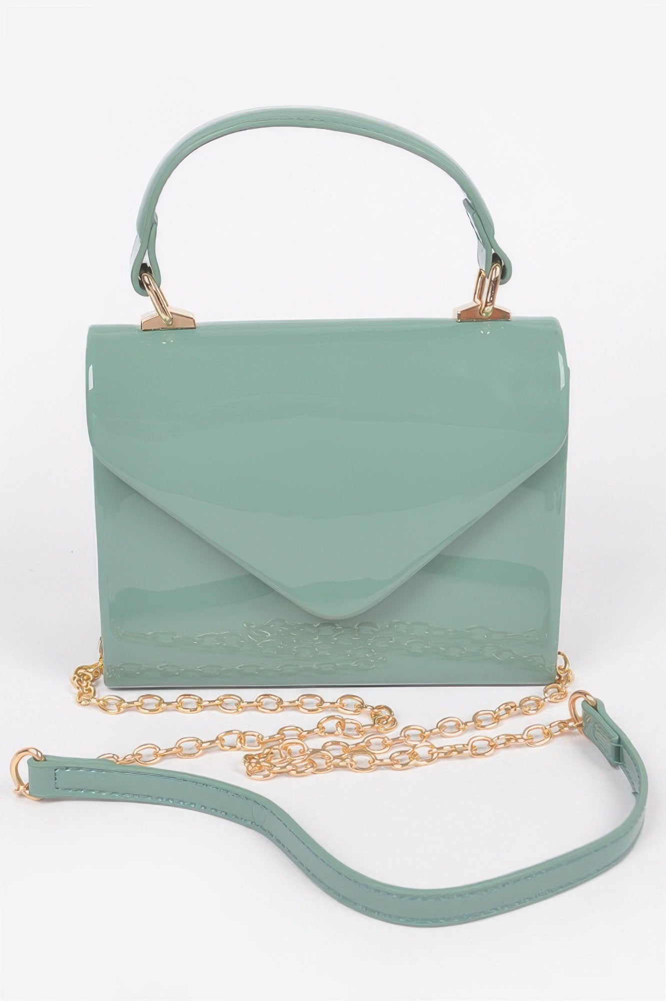 Enamel faux leather single handle clutch bag by Toshe Women's Fashions, featuring a sleek design and a top handle.
