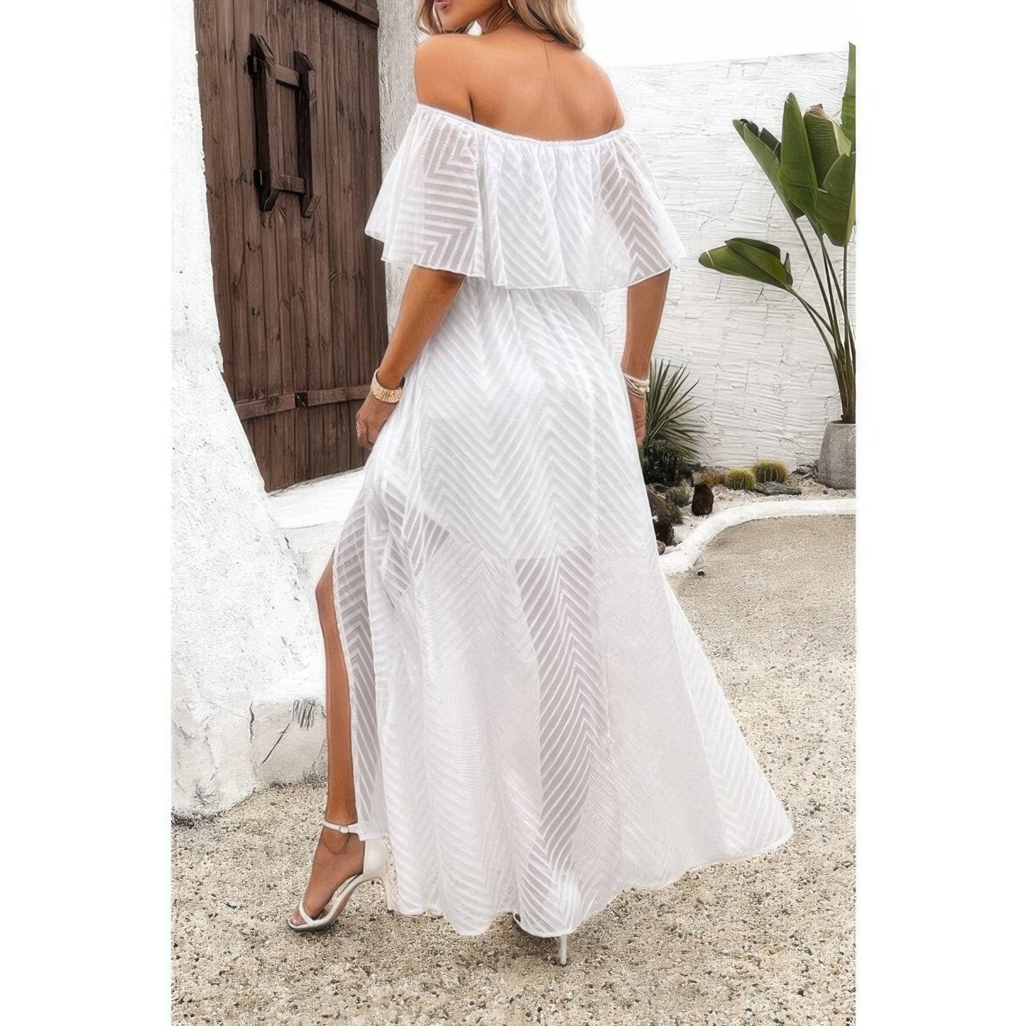 Off shoulder tassel ruffle trim split dress by Toshe Women's Fashions, featuring flowing fabric and stylish design.