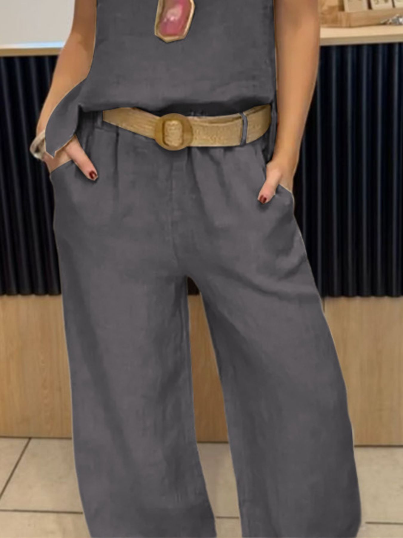 Casual round neck tank top and matching pants set by Trendsi, lightweight fabric, relaxed fit, perfect for everyday wear.