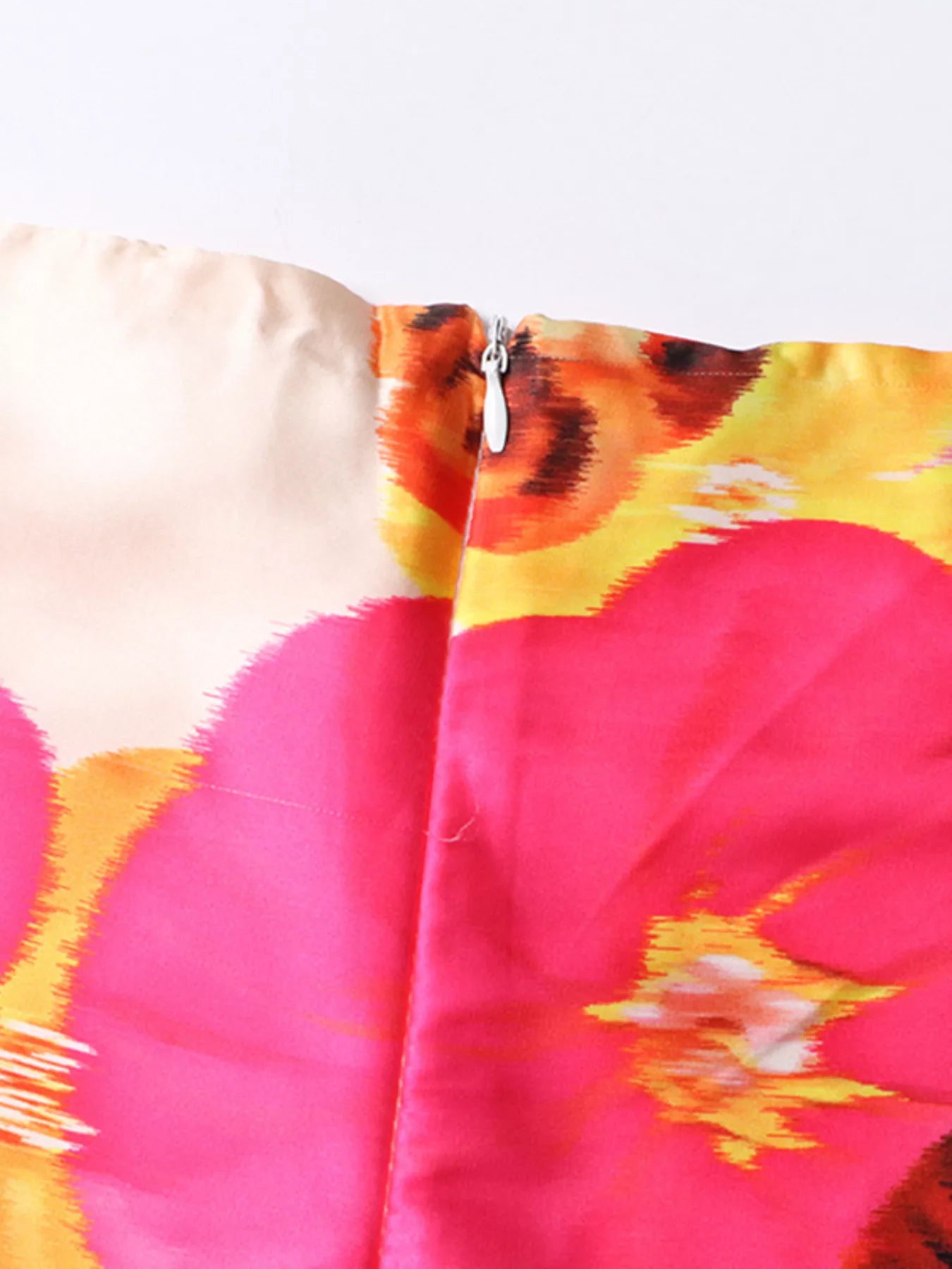 Floral print off-shoulder top and matching pants set from Trendsi, featuring lightweight fabric and vibrant flower design.