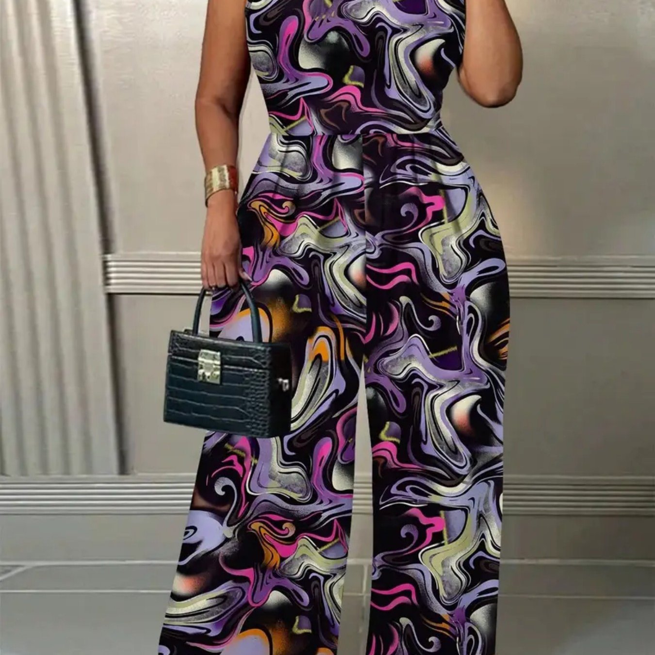 Sleeveless Round Neck Flared Hem Jumpsuit – Elegant, Flowy & All-in-One Statement Look