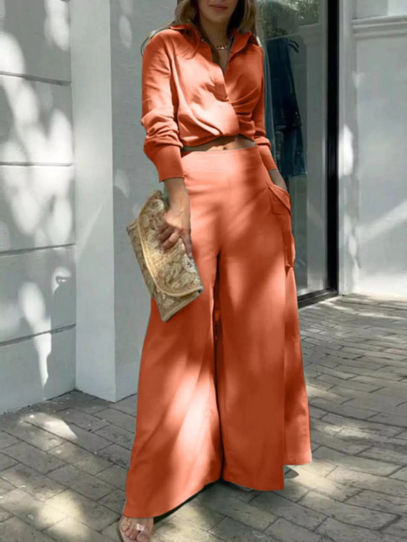 Button front shirt with chest pocket and wide-leg pants set from Trendsi, shown in a stylish, casual outfit.