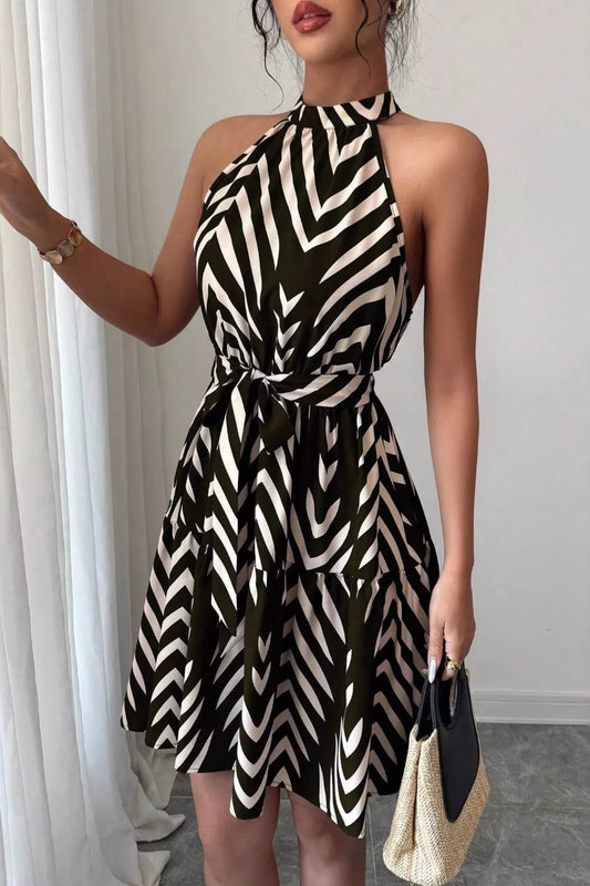 Zebra print halter neck dress by Trendsi featuring tie waist and ruffle hem, stylish and flowy fashion dress.
