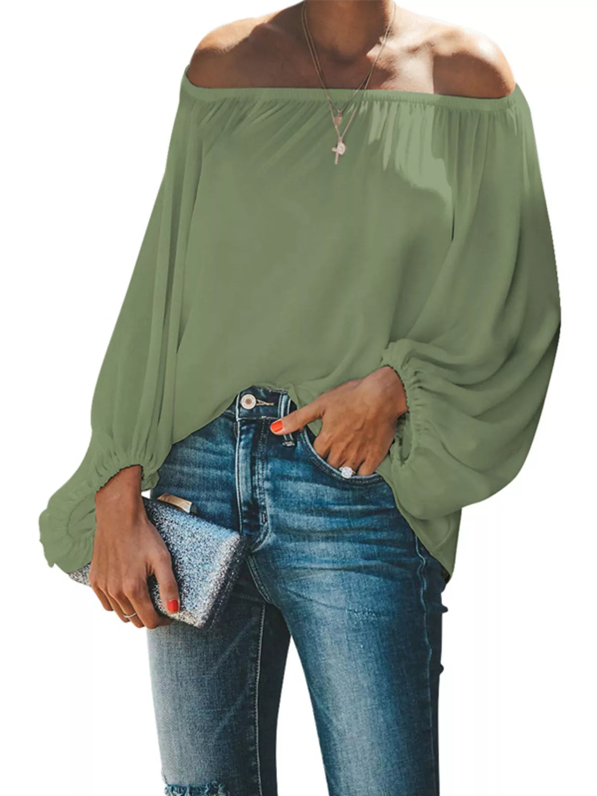 Off-shoulder balloon sleeve blouse from Trendsi, featuring a stylish design and flowy fabric, perfect for casual or dressy occasions.