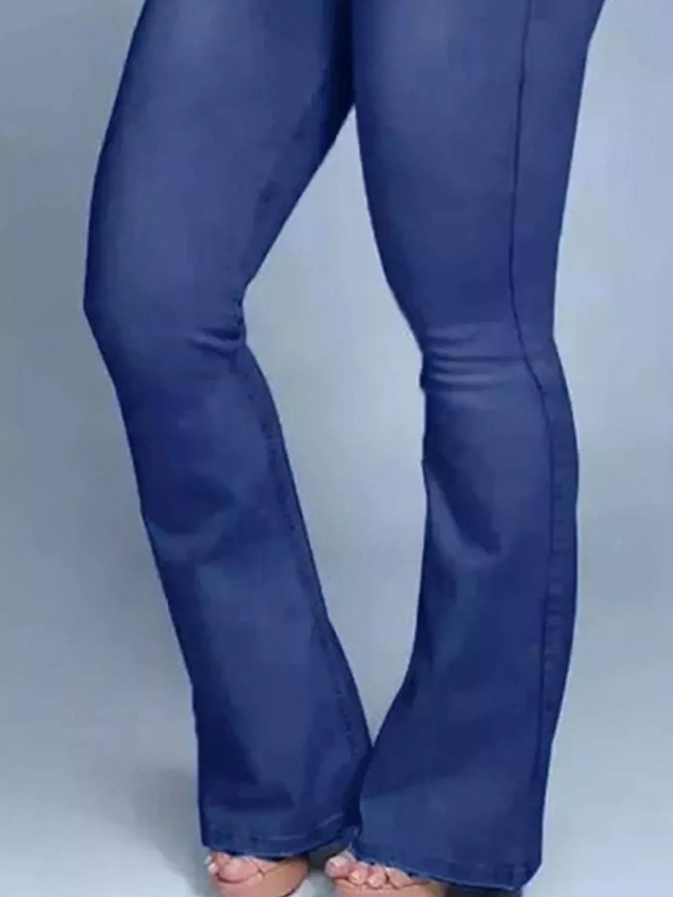 High-waisted flare jeans from Trendsi, styled as casual bottoms with a fitted waist and wide flare legs, in a denim fabric.