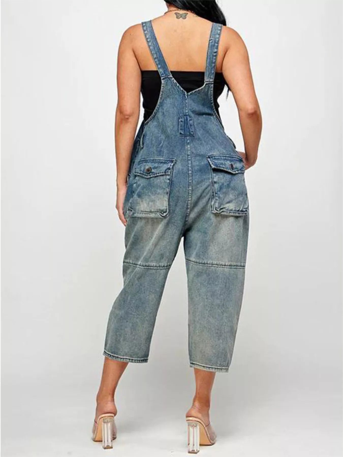Trendsi denim button-front overalls with front and back pockets, casual style, worn by a person standing outdoors.
