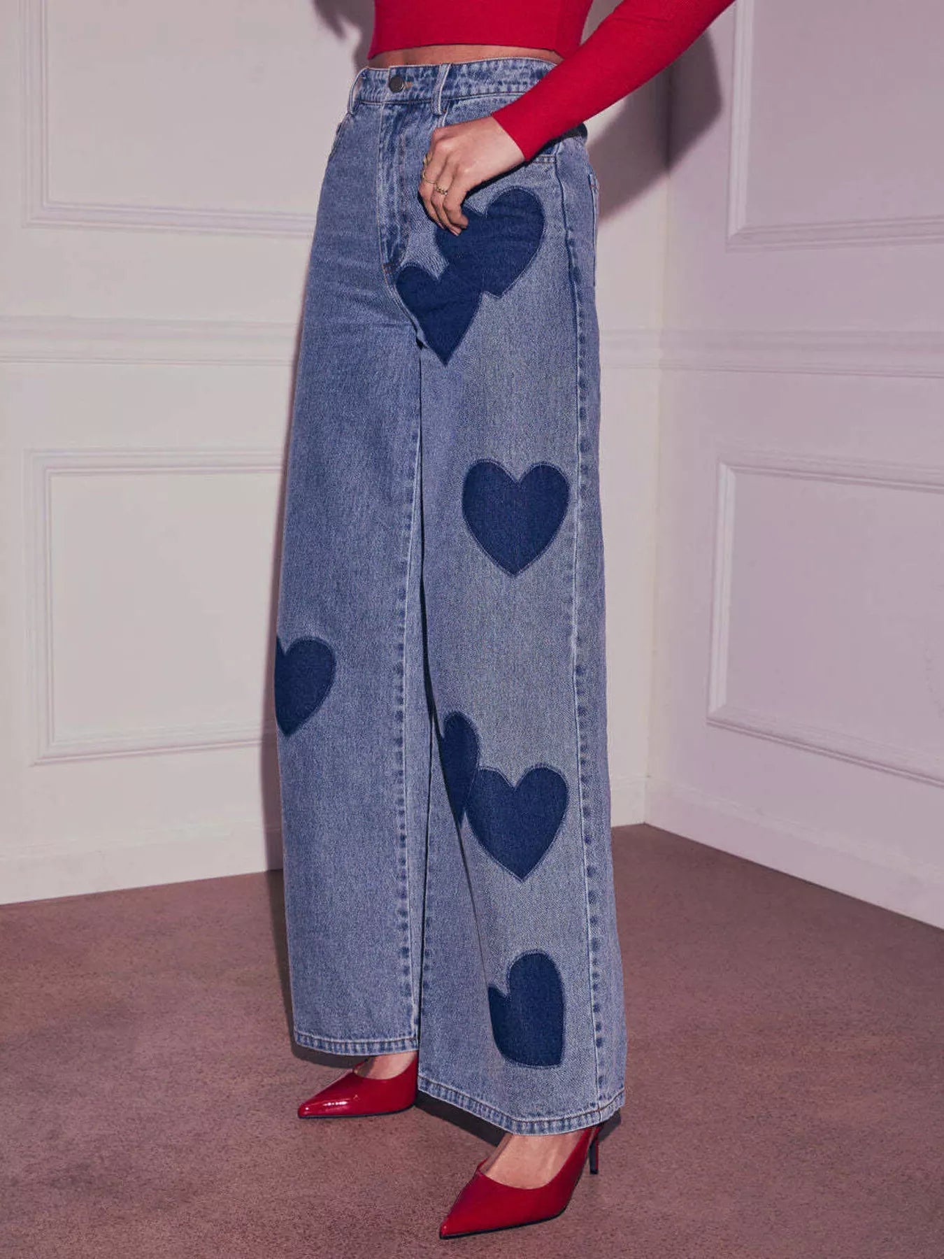 Heart high waist wide-leg denim jeans by Trendsi, featuring a stylish fit and classic blue wash, shown from the front.