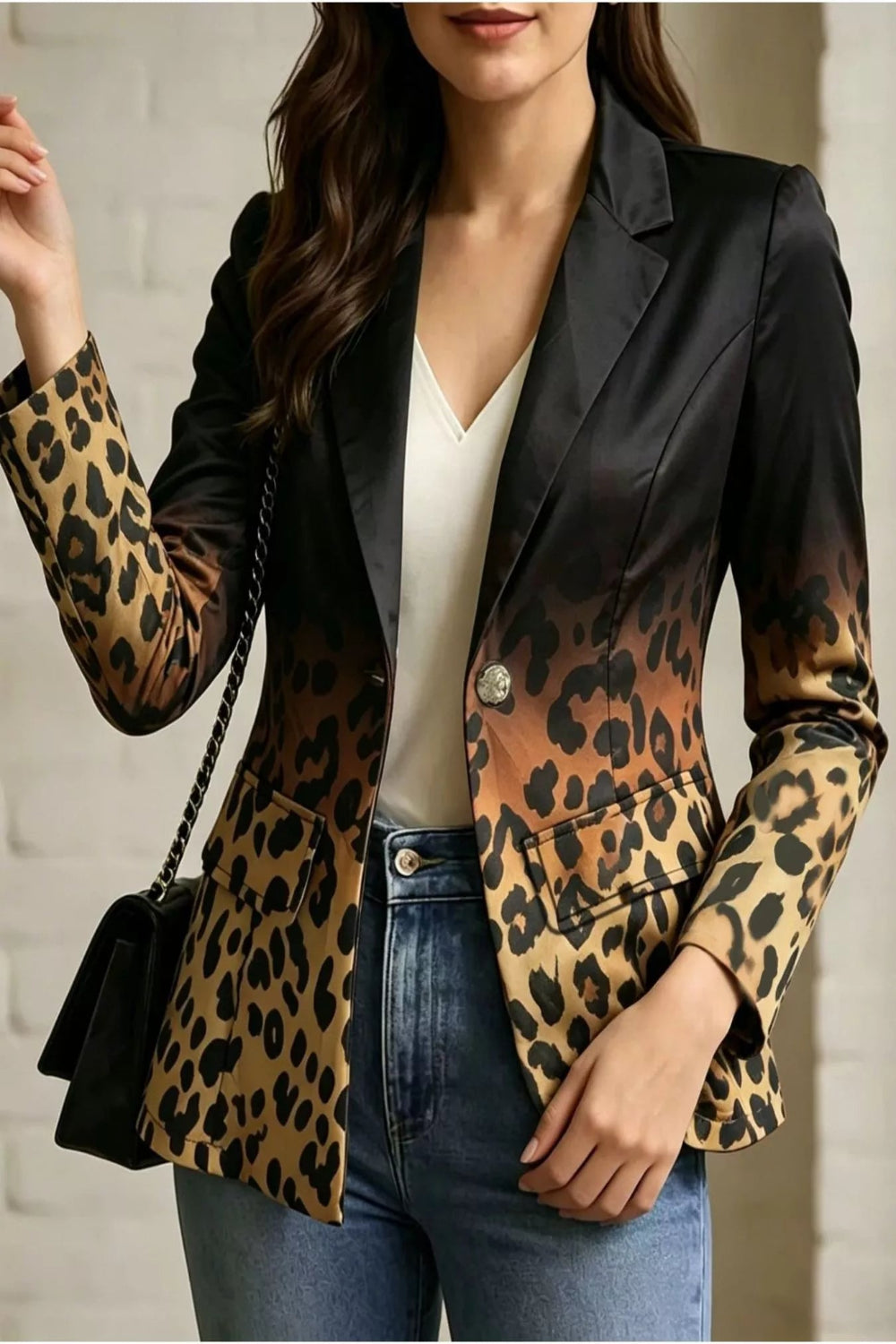 Leopard print contrast blazer by Trendsi, tailored fit with bold animal pattern, stylish for casual or professional wear.