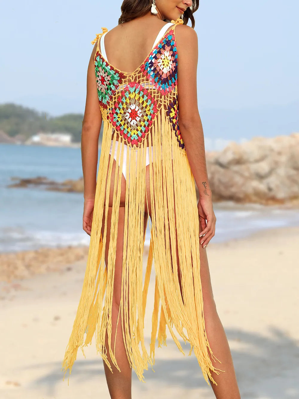 Trendsi fringe spaghetti strap swimwear cover-up with flowy fabric and fringe detailing, perfect for beach or poolside fashion.