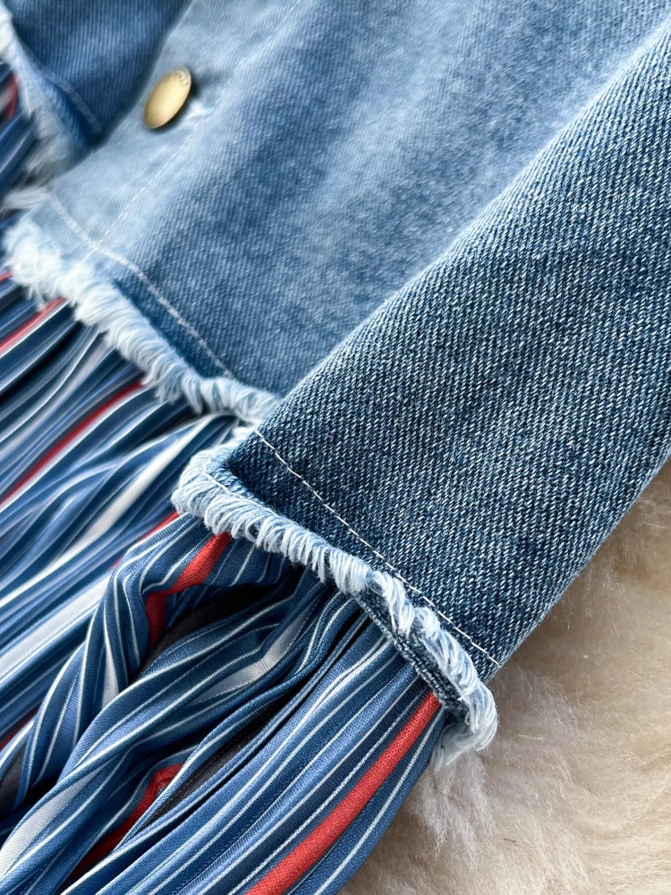 Striped patchwork denim skirt from Trendsi, featuring a stylish design with mixed patterns and a classic denim finish.