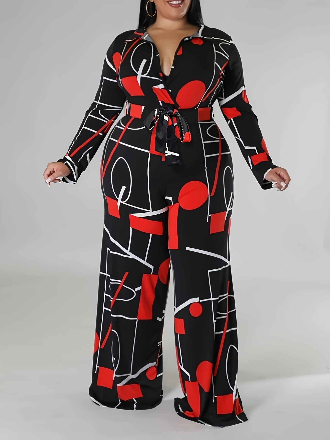 Geometric Print Belted Jumpsuit – Lapel Collar, Wide-Leg & Statement Style