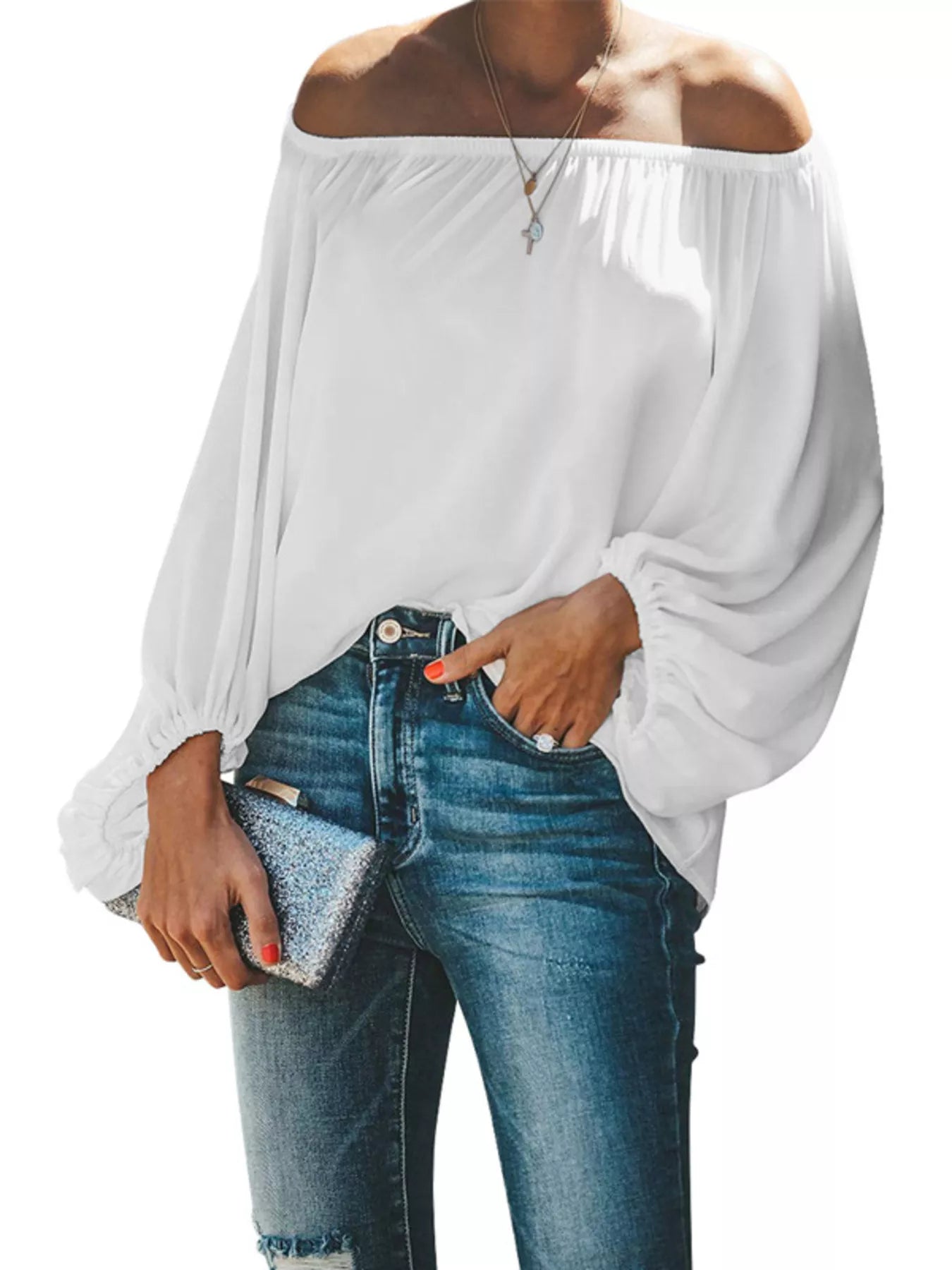 Off-shoulder balloon sleeve blouse by Trendsi, stylish tops and blouses with ruffled off-shoulder design and voluminous sleeves.