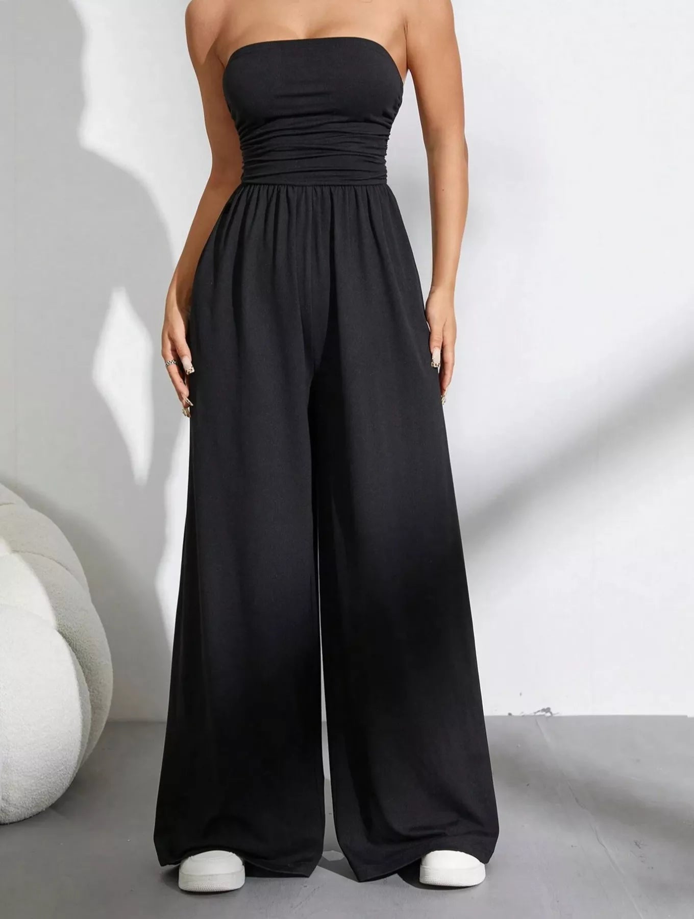 Trendsi Effortless Chic tube top wide-leg jumpsuit, stylish sleeveless one-piece outfit with a fitted top and flowing wide-leg pants.