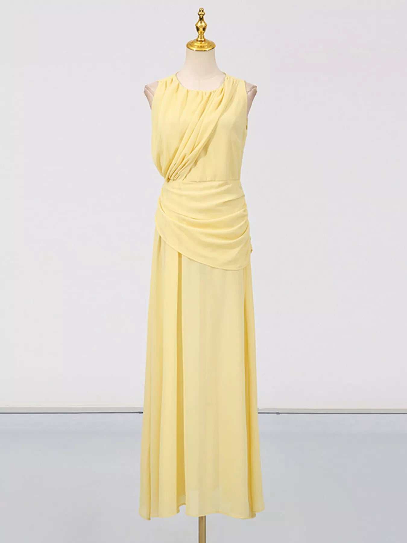 Yellow sleeveless ruched high-slit maxi dress from Trendsi, featuring a flowing design and elegant slit detail.