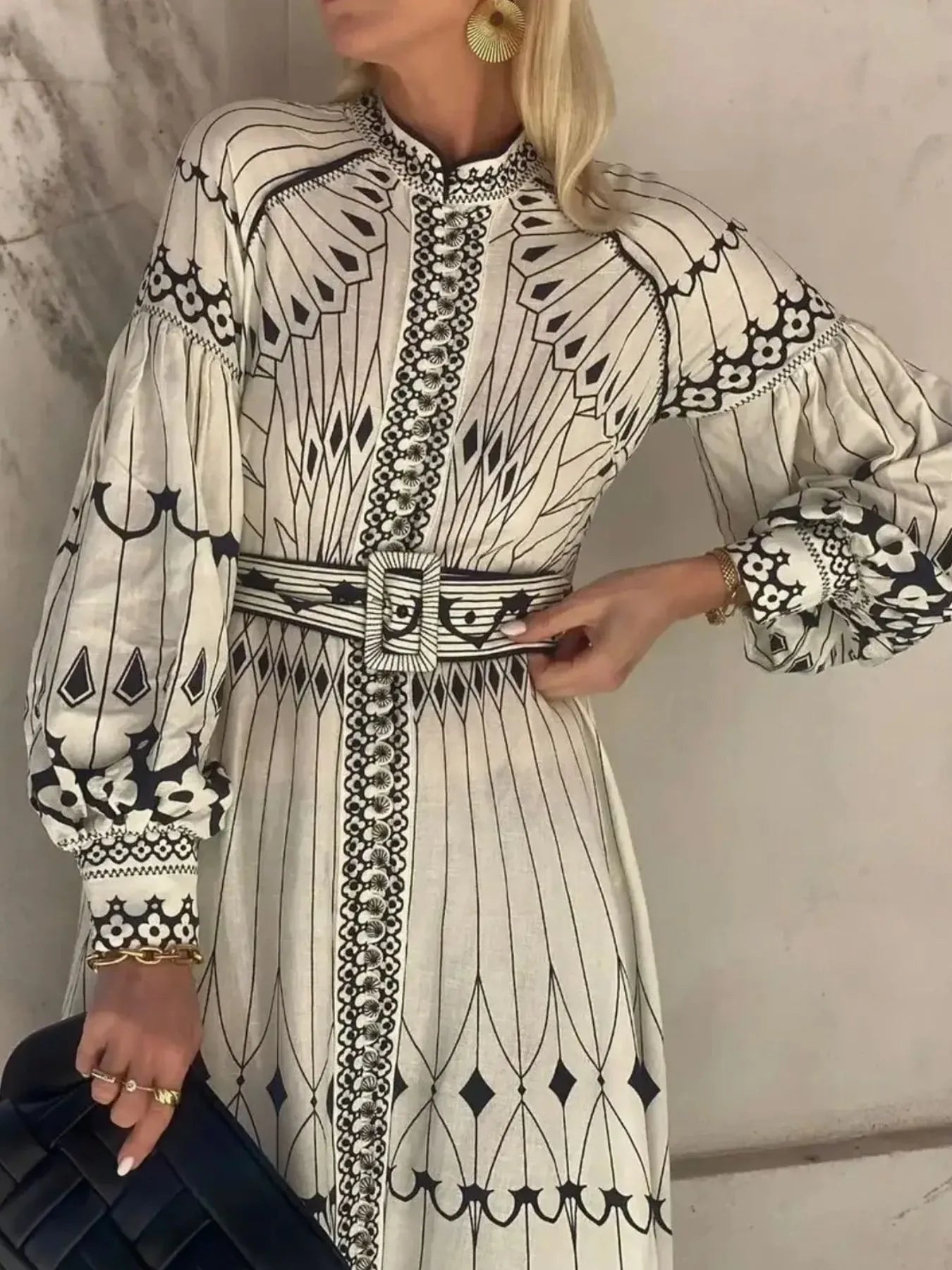 Printed shirt dress with belt from Trendsi, featuring a stylish design, button front, and waist tie for a casual yet chic look.