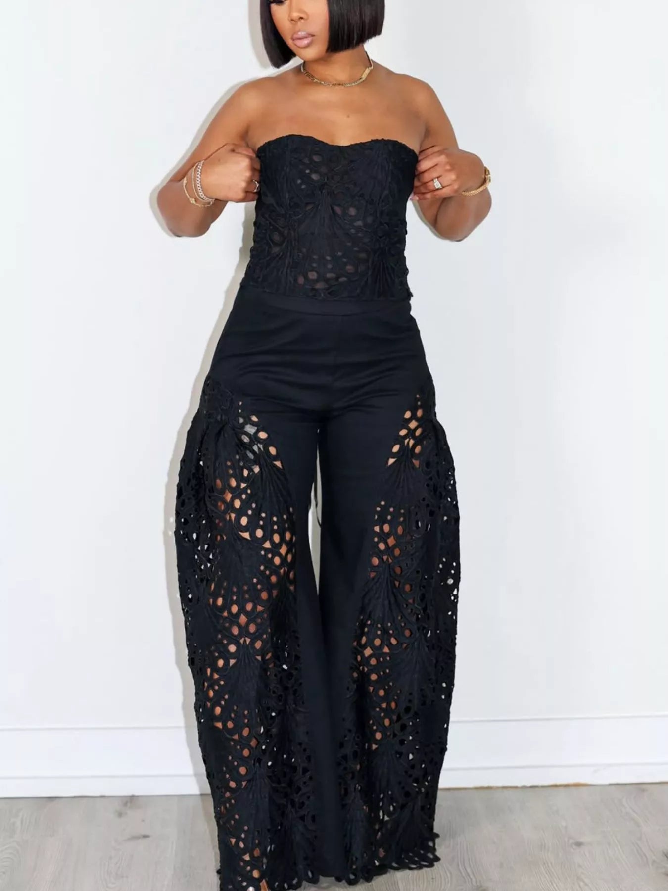 Trendsi cutout tube top and wide-leg pants matching set, featuring a stylish sleeveless crop top and flowy high-waisted pants.