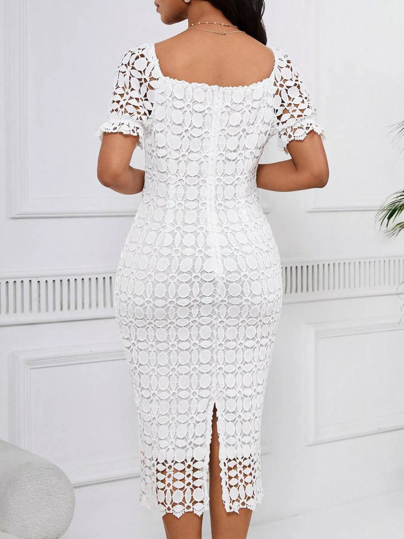 Lace short sleeve midi dress by Trendsi featuring a fitted bodice and flowing skirt, perfect for elegant occasions.