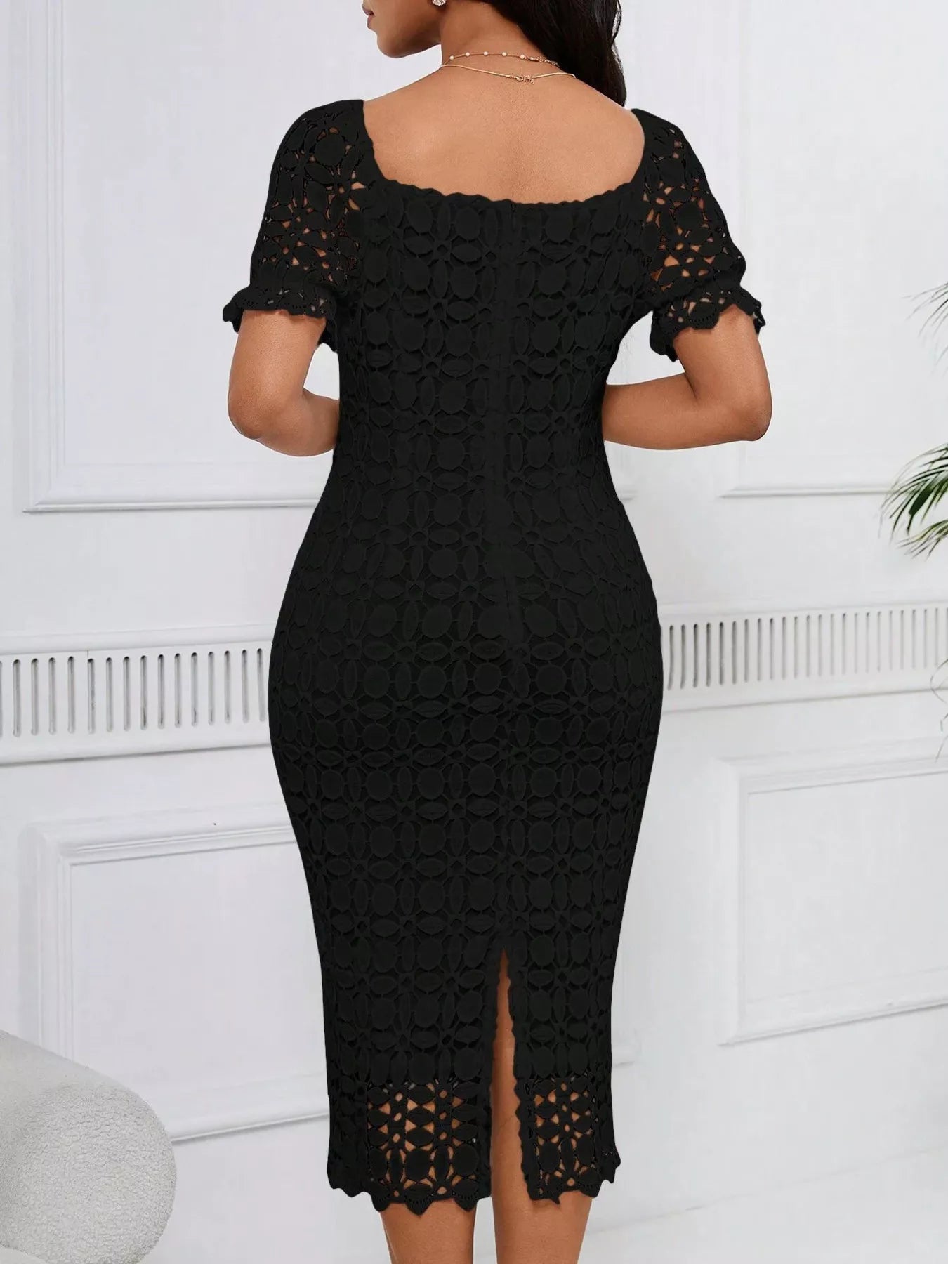 Lace short sleeve midi dress from Trendsi featuring a fitted bodice and flowing skirt, perfect for stylish occasions.