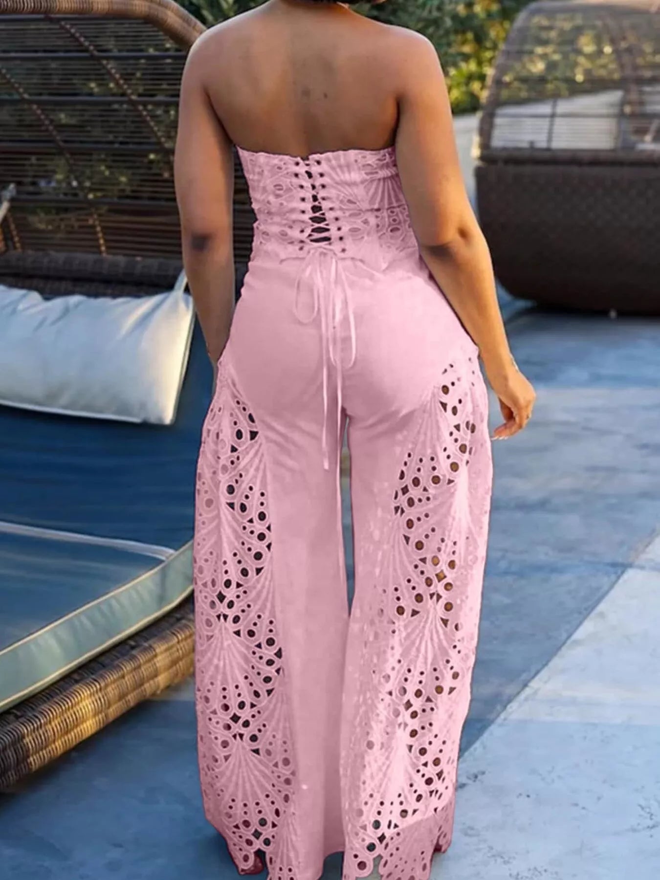 Hollow-out tube top and pants set by Trendsi, stylish 2-piece outfit with cut-out details, perfect for trendy casual wear