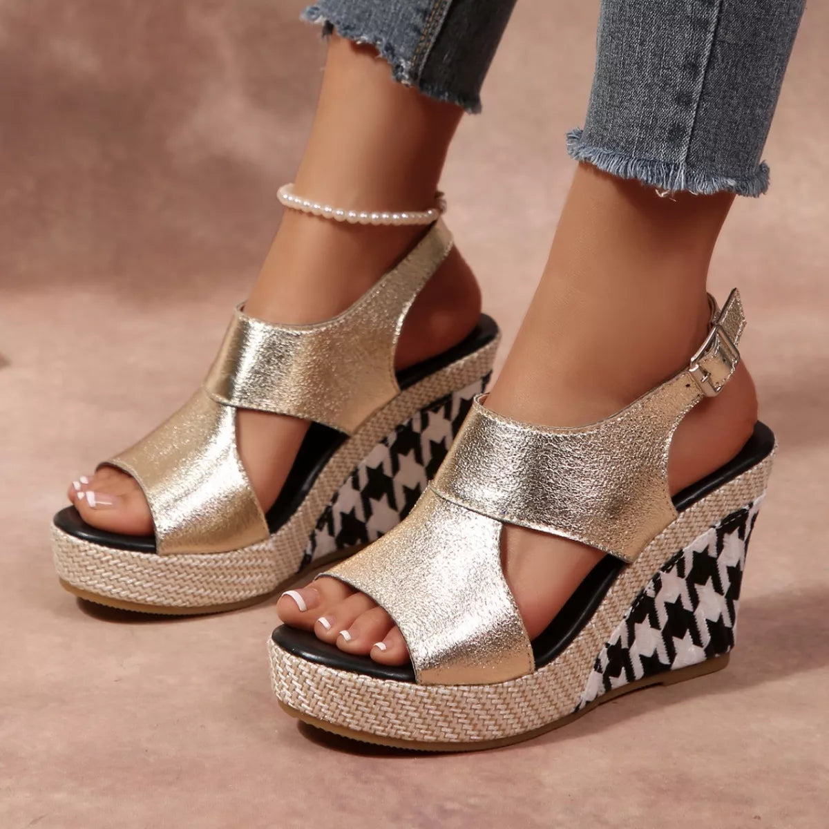 Open toe wedge sandals by Trendsi featuring a stylish design with a comfortable heel and ankle strap, perfect for warm weather.