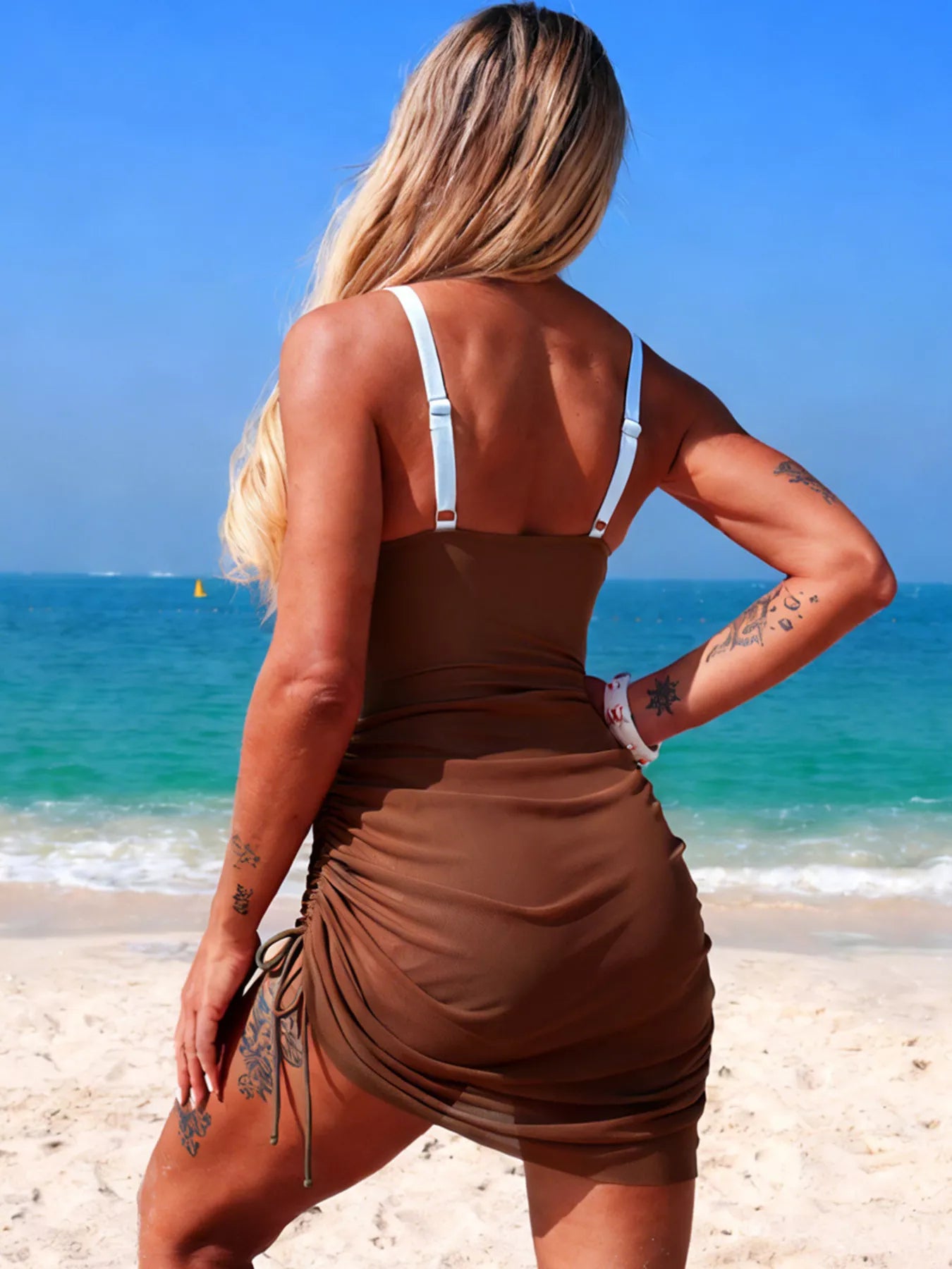 Color block cutout one-piece swimsuit by Trendsi featuring bold color blocking and stylish cutout details on a sleek swimwear design.