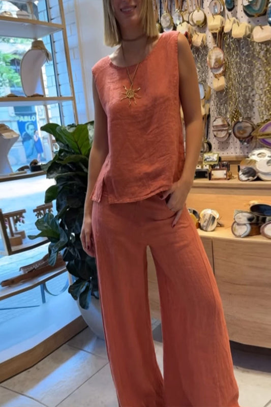Casual round neck tank top and matching pants set by Trendsi, featuring a comfortable fit and stylish design.