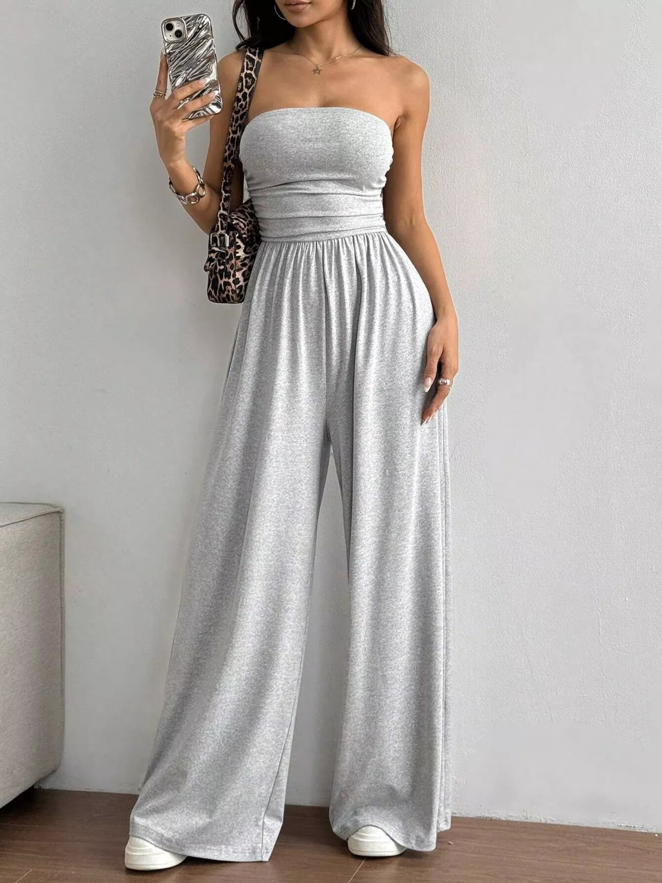 Trendsi effortless chic tube top wide leg jumpsuit, stylish and comfortable one-piece outfit with a fitted tube top and wide-leg pants.