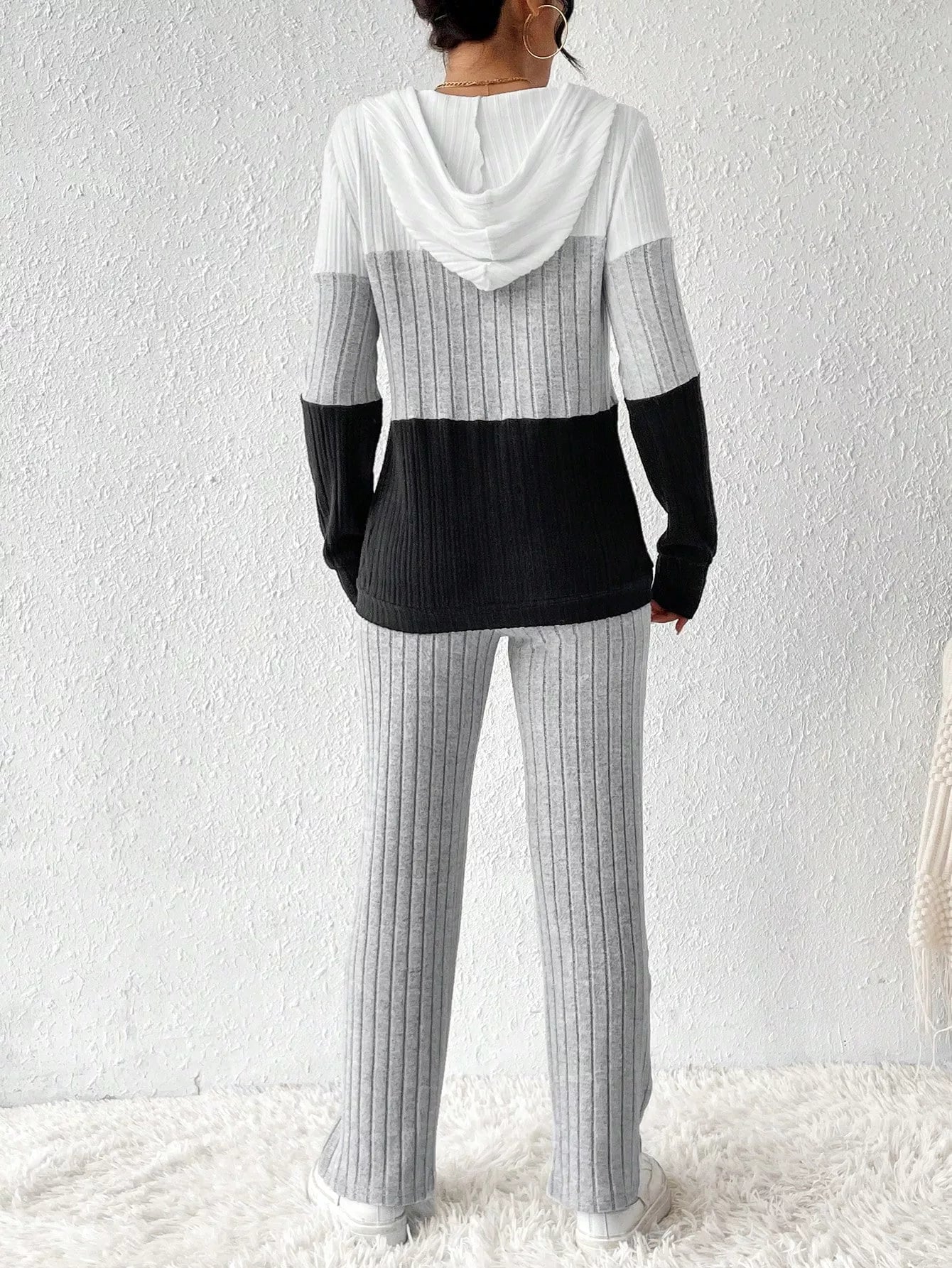 Color block half zip hooded top and pants set by Trendsi, featuring vibrant color blocking and casual athletic style.