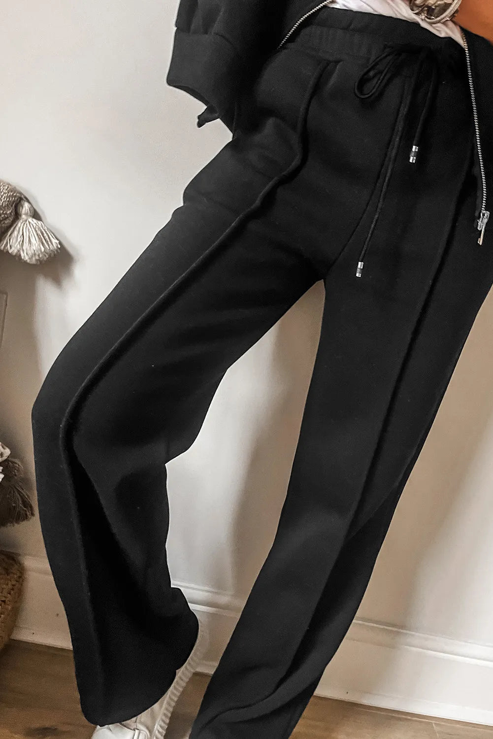 Trendsi zip-up long sleeve top and pants set in soft fabric, featuring a stylish casual look with a front zipper and relaxed fit.