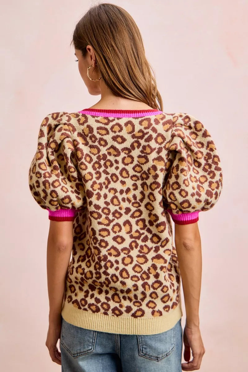 Leopard pattern puff sleeve V-neck sweater top from Trendsi, featuring a cozy knit design with bold animal print.