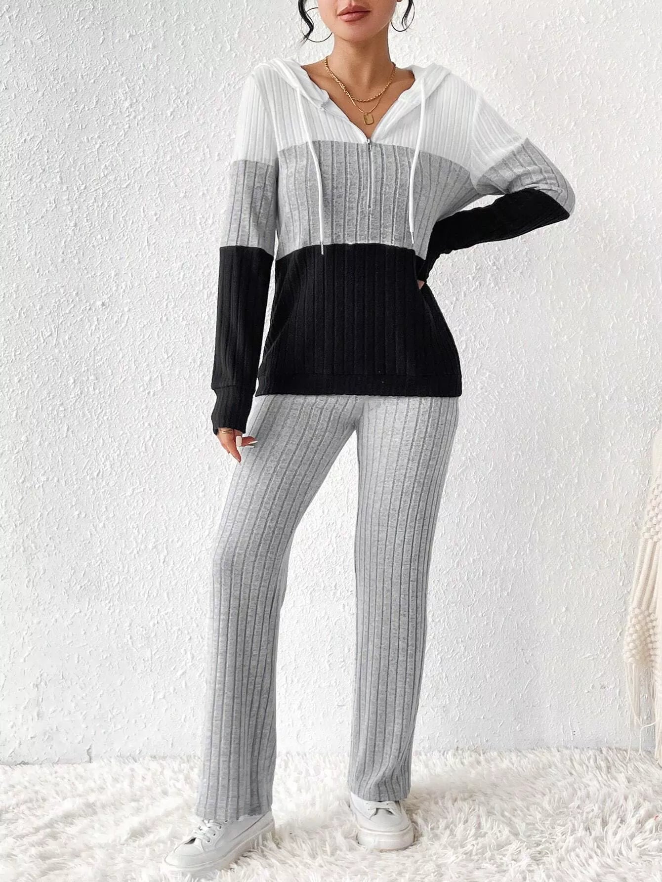 Color block half zip hooded top and pants set by Trendsi, featuring a stylish, casual two-piece outfit in vibrant colors.