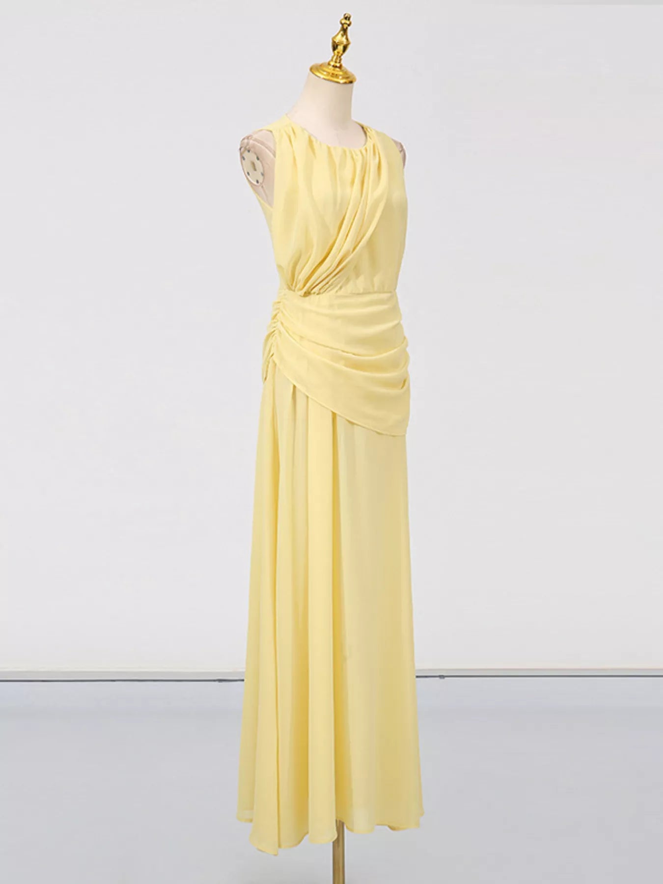 Yellow sleeveless maxi dress with ruched bodice and high slit, stylish summer dress by Trendsi.