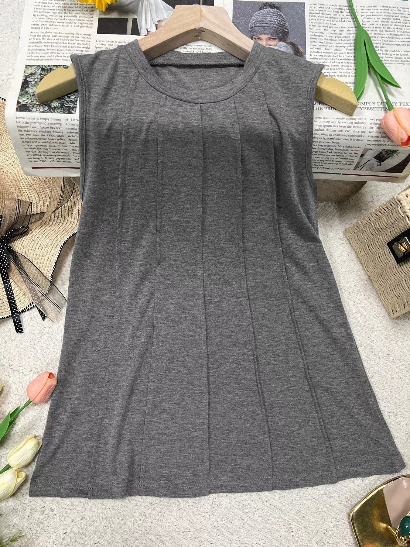 Wide ribbed detailed tank top from Trendsi, featuring a fitted design with textured ribbing and sleeveless style.