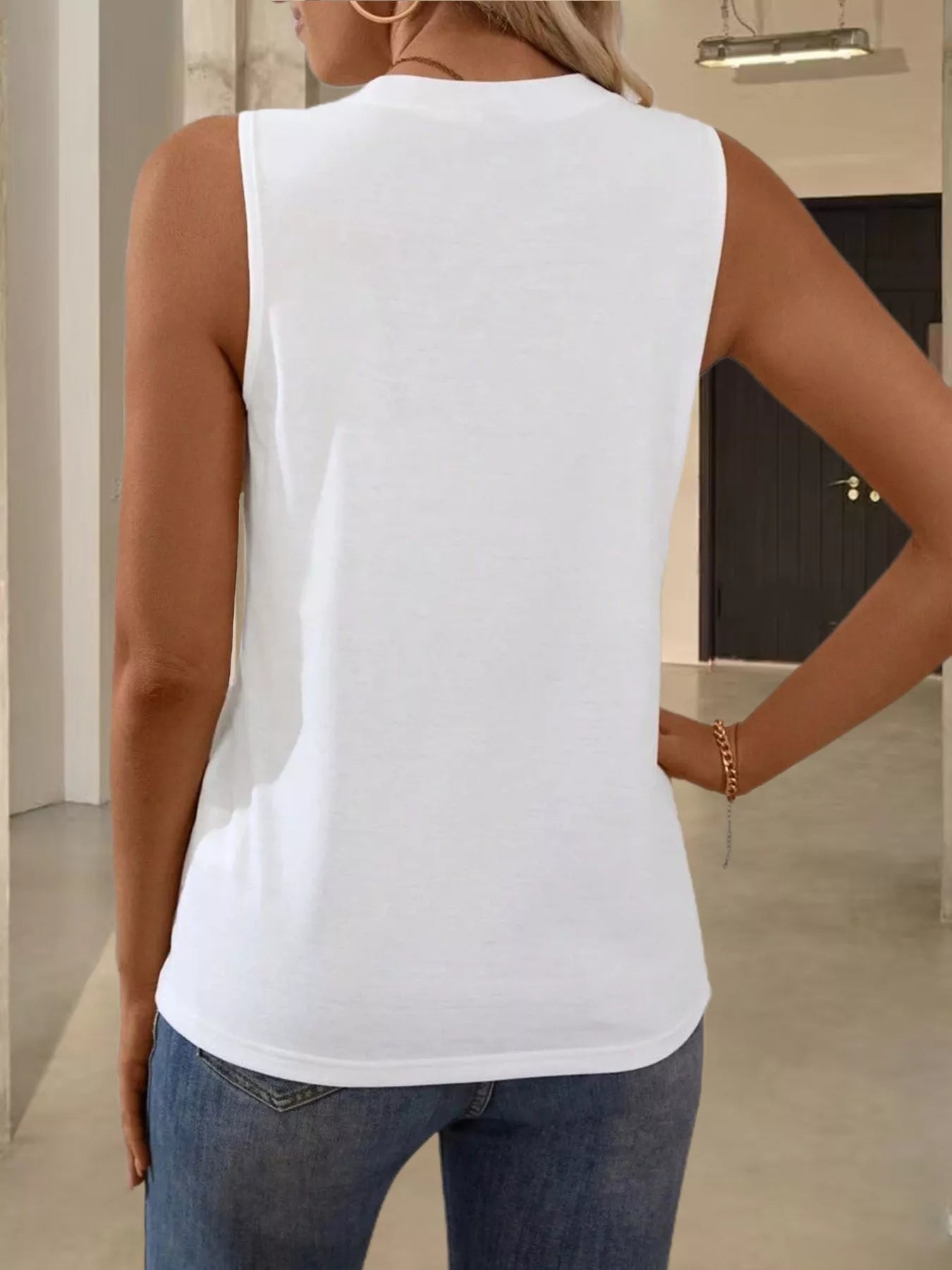 Wide ribbed tank top with detailed design in neutral color, from Trendsi, showcasing its fitted style and textured fabric.
