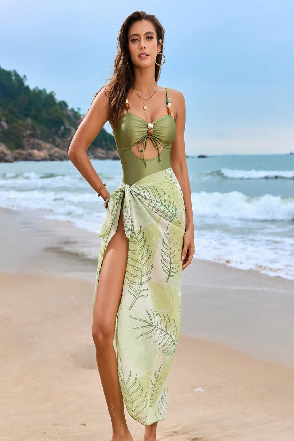 Trendsi cutout sweetheart neckline one-piece swimsuit with matching cover-up, featuring a stylish and flattering beachwear design
