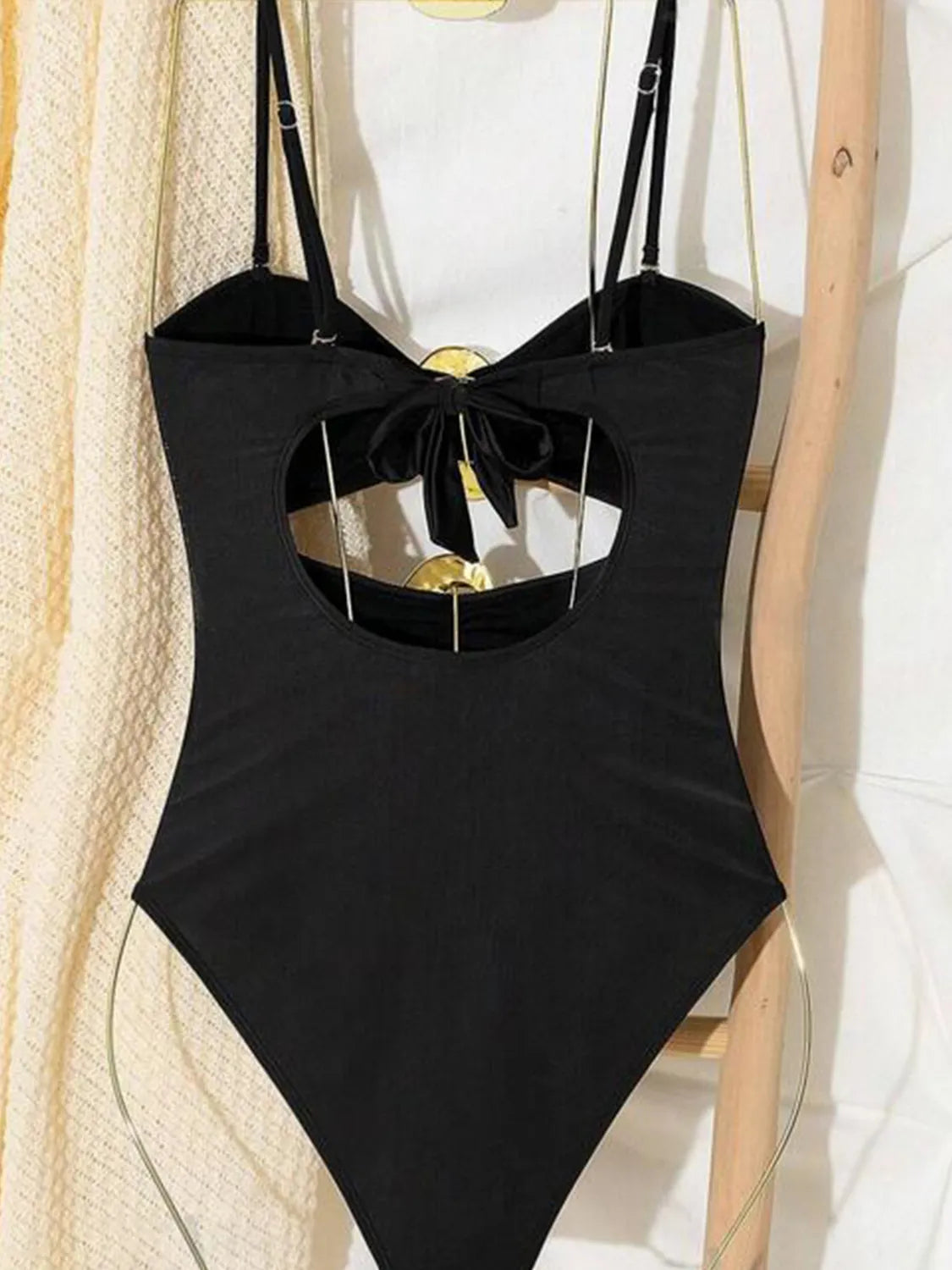 Trendsi cutout sweetheart neck one-piece swimwear in vibrant color, featuring a stylish plunging neckline and sleek design.