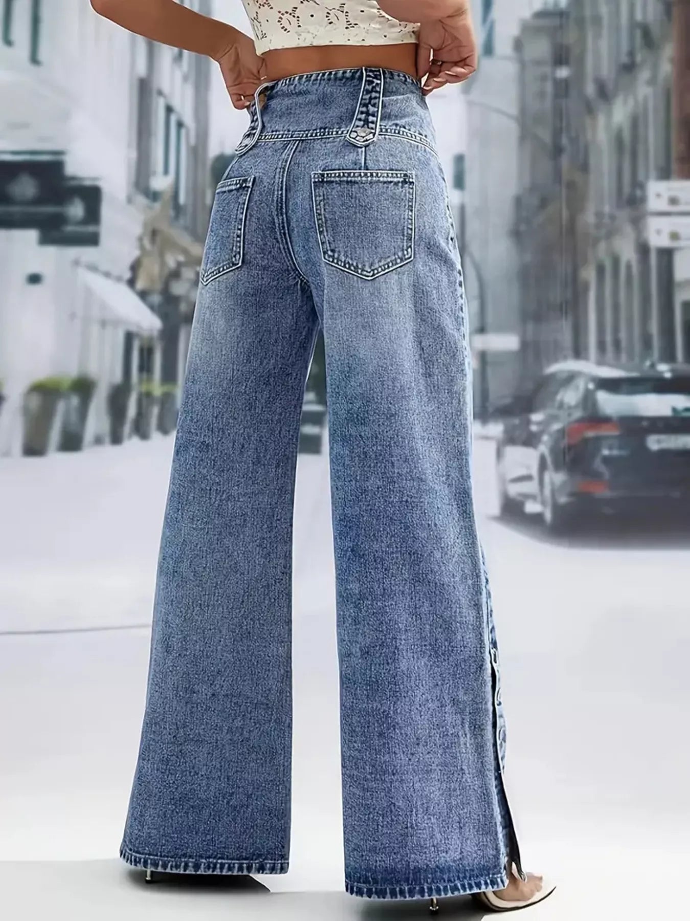 High waist denim wide-leg jeans with button decor from Trendsi, showcasing the relaxed fit and stylish design.