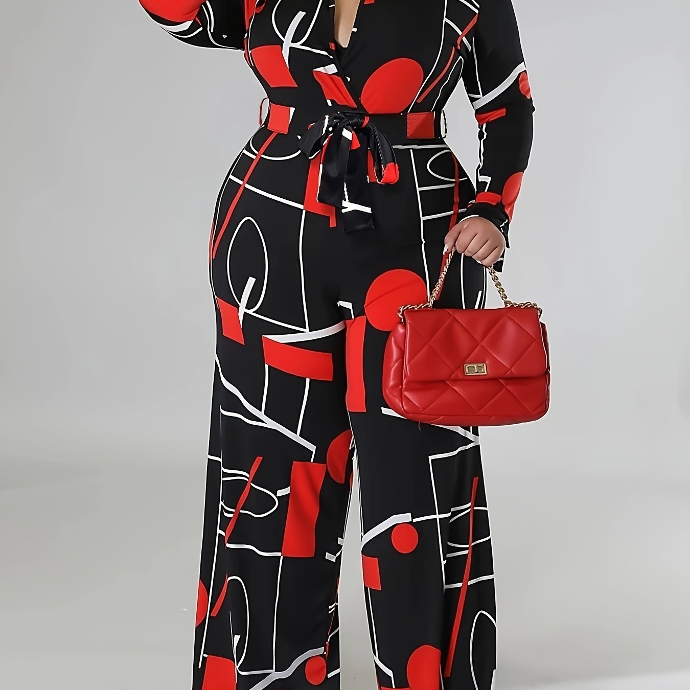 Geometric Print Belted Jumpsuit – Lapel Collar, Wide-Leg & Statement Style