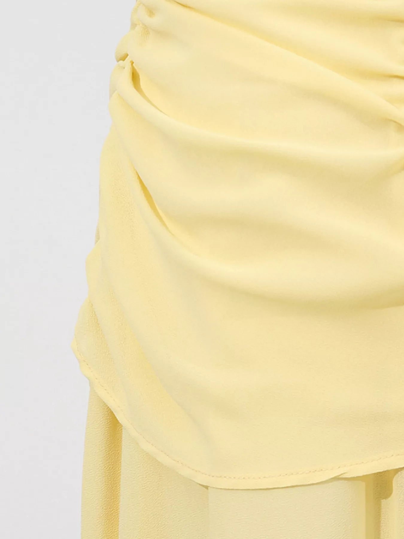 Yellow sleeveless ruched high-slit maxi dress by Trendsi featuring a flowing silhouette and stylish design.