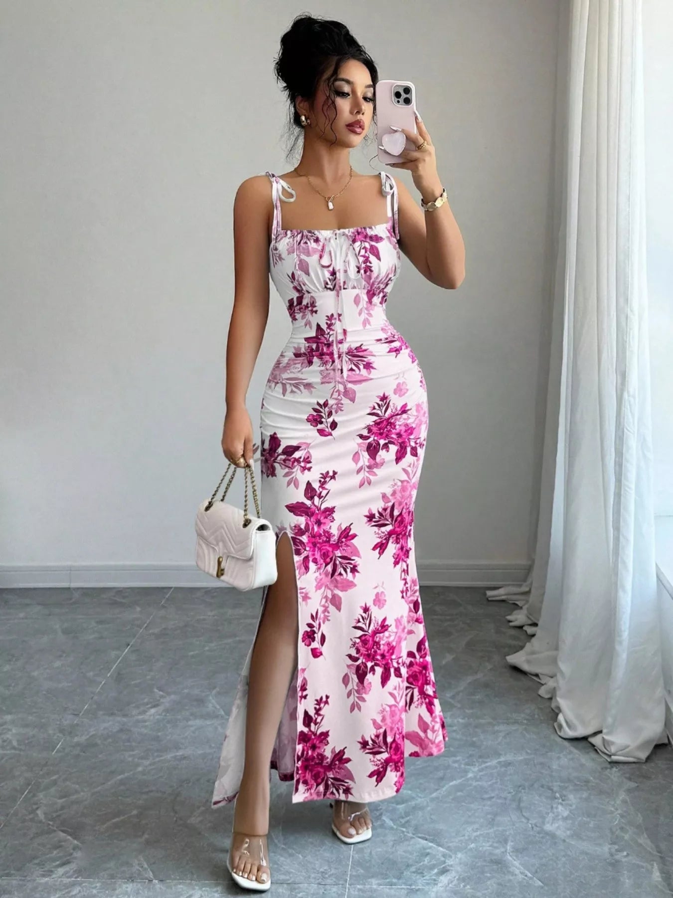 Printed tie-strap slit maxi dress by Trendsi featuring a flowy silhouette and stylish slit detail for a chic look.