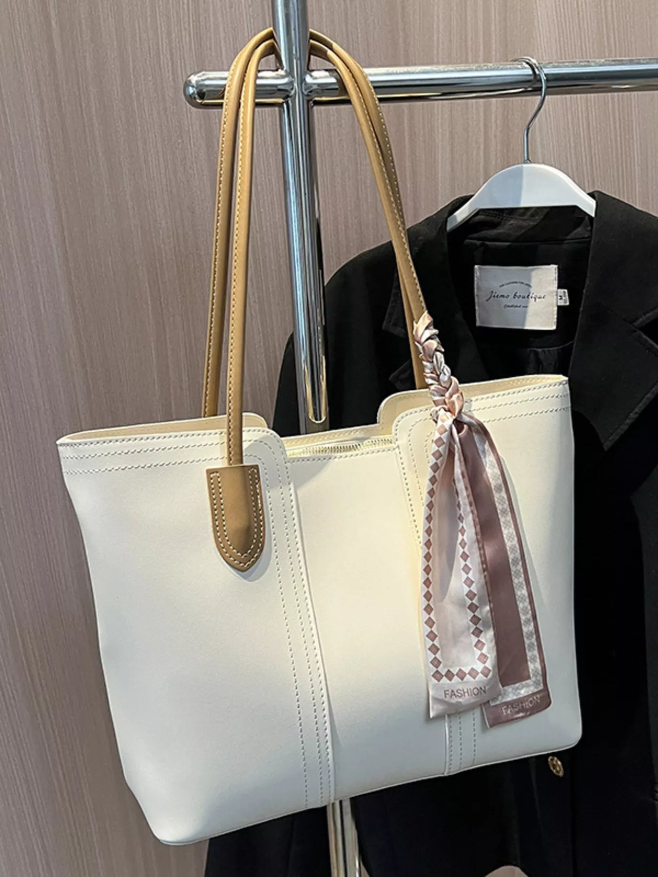 Casual Trendsi tote shoulder handbag with dual handles and spacious interior, perfect for everyday use and casual outings.