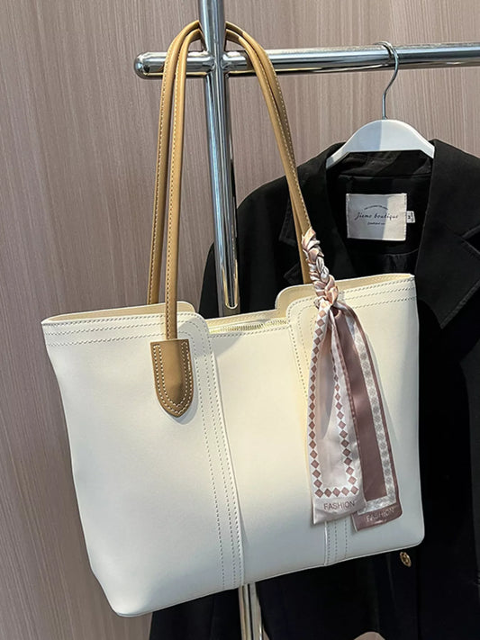 Casual Trendsi tote shoulder handbag with dual handles and spacious interior, perfect for everyday use and casual outings.