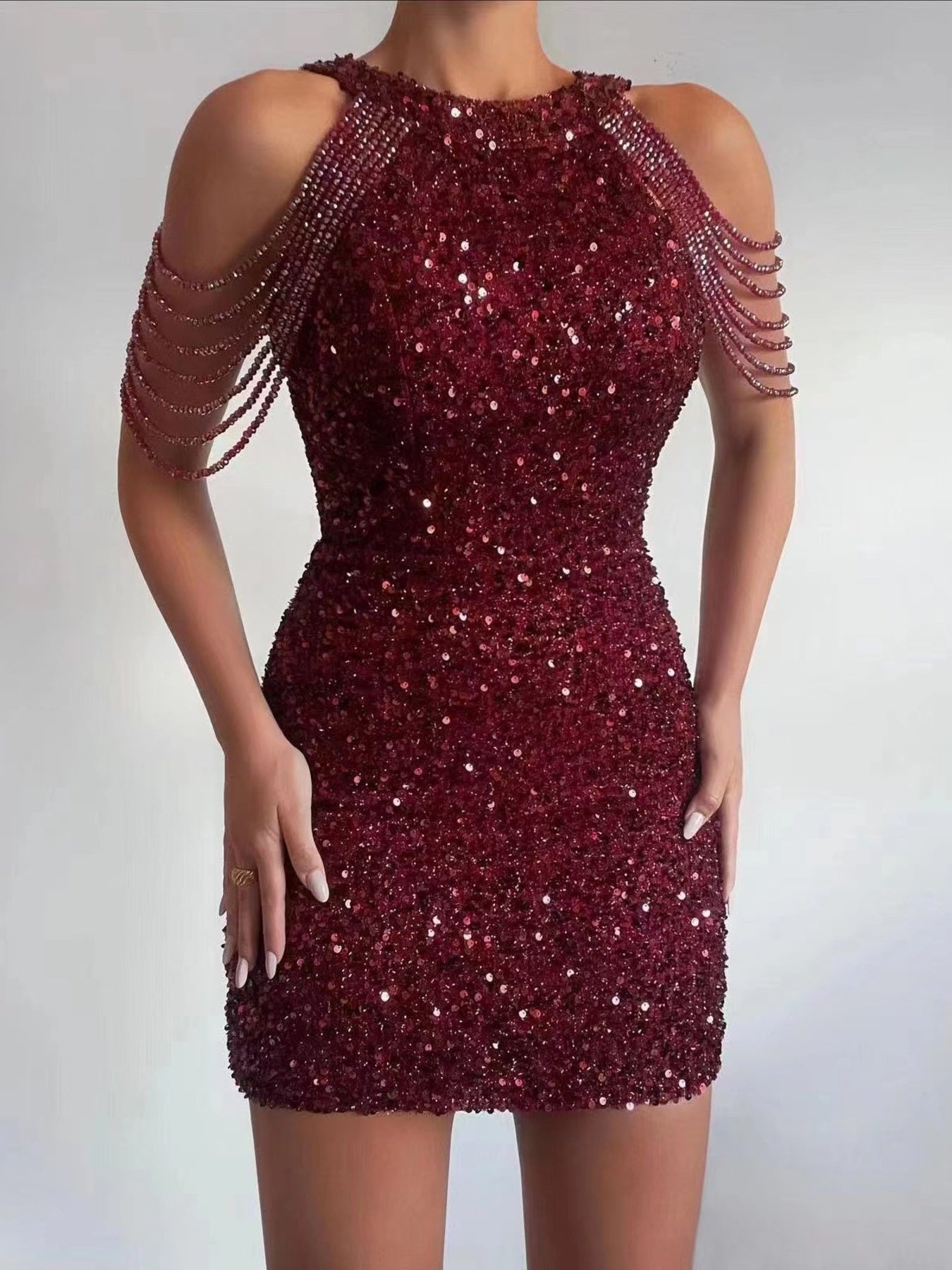 Sequin embellished black bodycon mini dress for after 5 occasions, stylish and form-fitting from Trendsi.